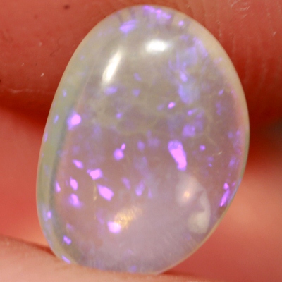 SOLID CRYSTAL OPAL Transparent with rich purple sparkles